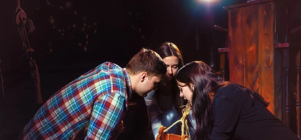 Two players working on a puzzle together inside an Escape This room